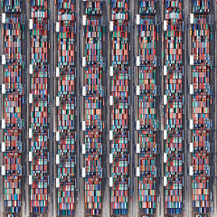 An enormously detailed aerial view of a container shipping port in Hong Kong