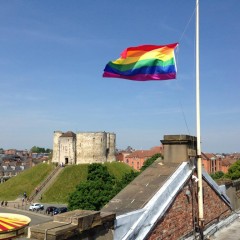 The Rainbow Flag flies high over York Castle Museum and Clifford's Tower