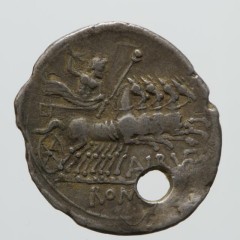Reverse of a pierced coin showing Jupiter YORYM:2000.1153