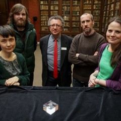 Dr Chantal Conneller (The University of Manchester), Tom Bell, Dr Keith Emerick (Historic England), Dr Barry Taylor (University of Chester) and Professor Nicky Milner (University of York) with the 11,000 year old engraved shale pendant discovered by archaeologists during excavations at the Early Mesolithic site at Star Carr in North Yorkshire. Image taken at the Yorkshire Museum, York. Credit: Suzy Harrison