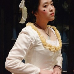 Volunteer Jin modelling one of Lindsey Holmes' replica costumes.