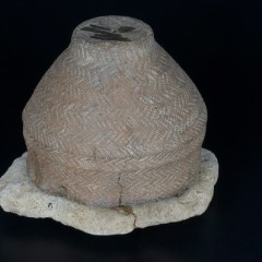 Bronze Age pottery urn - A rare Bronze Age cooking pot which was re-used as a cremation urn. Image © York Museums Trust