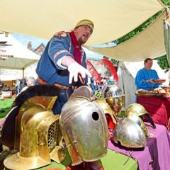 Roman re-enactor at a trade stall in the York Museum Gardens