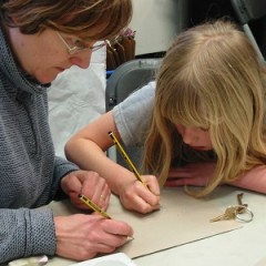 A mother and daughter take part in drawing at York Art Gallery