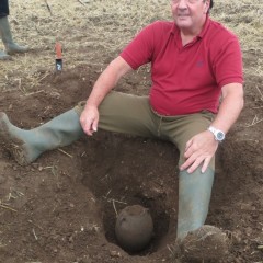 David Blakey with the in-situ hoard prior to removal.