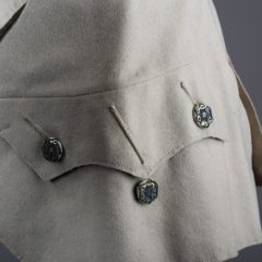 Close up of decorative pocket on men's 18th century jacket