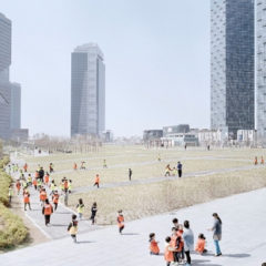 Groups of adults and children walking through an open space, which is surrounded by skyscrapers.