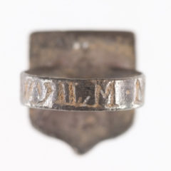The band and back of an historic ring. Inscriptions have been made on the band.